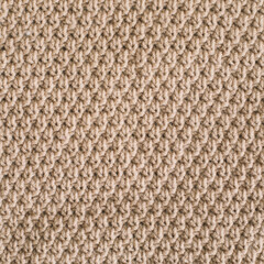 Wall Mural - Knitted texture background. Knitting pattern of wool. Knitting. Texture of woolen fabric for wallpaper and abstract background.