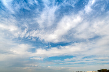 Wall Mural - Wind clouds over the sea