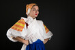 © muro - Slovak folklore. Girl in slovak folk dress.
