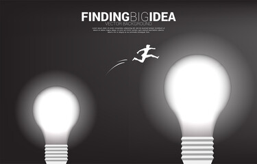 Poster - Silhouette of businessman jumping from small bulb to big one.Concept for business risk for finding big idea and design thinking