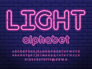 Wall Mural - Neon light alphabet design with uppercase, lowercase, numbers and symbols