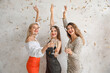 © Pixel-Shot - Young women with glasses of tasty champagne on light background
