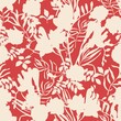 Floral tropical pattern with leaves on a red background. Seamless vector for textiles