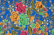 The sarong pattern of females is a beautiful and colorful art in Malaysian, Indonesian, and Thailand. Sarong texture art flowers and fashion for women in Asia. Close up photo, landscape background