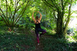 © Chris DoAl - Woman doing yoga in the forest