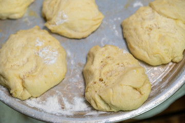 Wall Mural - Baking sweet pastries on a baking sheet