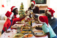 Multigeneration Family Having Christmas Dinner Together