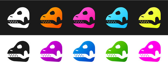 Sticker - Set Dinosaur skull icon isolated on black and white background. Vector.