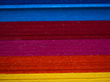 Fototapeta Tęcza - Texture of multicolored paper close up
