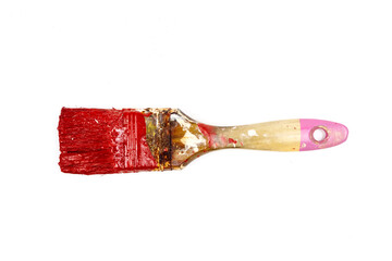 Paintbrush with red paint isolated on white background.