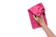  Hand Holding Pink Duster Microfiber Cleaning Cloth Isolated On White Background With Clipping Path. Space For Your Text. Top View.	