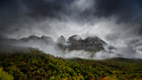 Fototapeta  - clouds over the mountains
