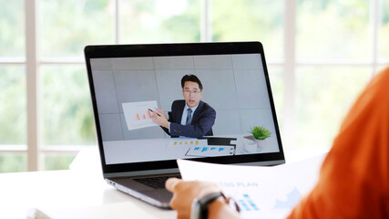 Wall Mural - Video conference, Work from home, Businessman making video call to employee with virtual web, Contacting manager by conference on laptop computer at home, Talking on web, Online consultation  business