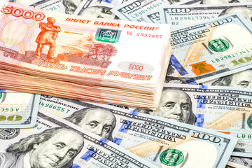 Wall Mural - Five thousandths banknotes of russian roubles and dollars