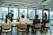 © visoot - Business people having a meeting in modern bright office interior brainstorming,Business concept.