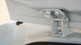 Fototapeta Tęcza - Close up of the upper door lock on the trunk of a modern car