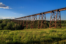 Train Trestle Passing Over A Field
