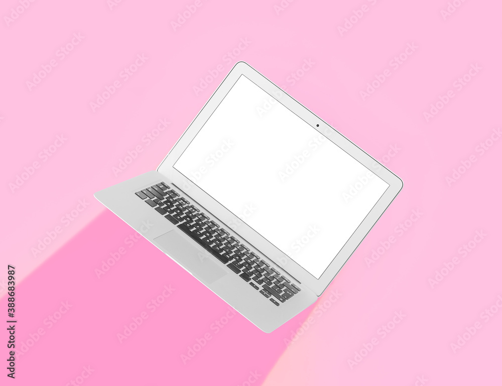 Modern laptop on color background