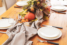 Beautiful Table Setting For Thanksgiving Day Celebration In Dining Room