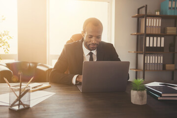 Wall Mural - Portrait of his he nice attractive classy focused guy ceo boss chief finance agent broker sitting in chair using laptop consulting client online law attorney at workplace workstation