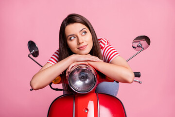 Sticker - Close-up portrait of her she nice attractive pretty charming dreamy cheery minded girl sitting on moped overthinking creating idea isolated over pink pastel color background