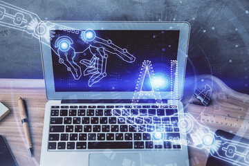 double exposure of desktop computer and technology theme hologram. concept of software development.