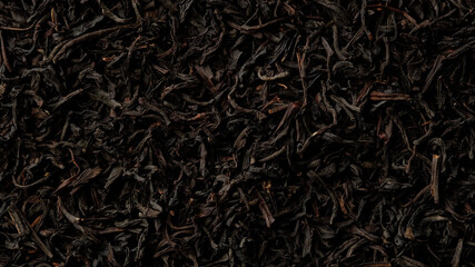 Wall Mural - Dried black tea leaves top view