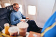 © Viacheslav Yakobchuk - Air traveler using his computer on the plane
