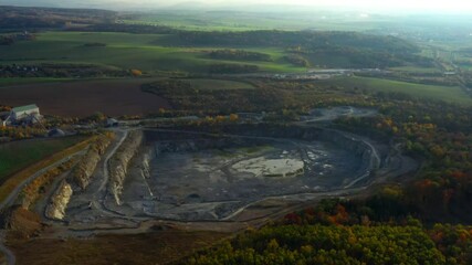 Canvas Print - Camera flight over a open cast mine. Industrial landscape. Heavy industry from above. 