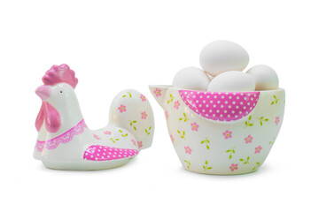 Eggs in ceramic easter chicken cookie jar on isolated white background