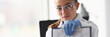 © H_Ko - Portrait of lab assistant holding clipboard with results of tests. Smiling scientist showing documents. Laboratory interior on background. Chemical experiments concept