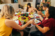 © kleberpicui - Brazilian Christmas. Family praying before Christmas dinner.