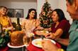 © kleberpicui - Brazilian Christmas. Family celebrating Christmas at home