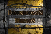 Lockdown Chaos Text Message On Textured Grunge Copper And Vintage Gold Background Lined With Barbed Wire
