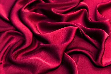Wall Mural - Luxurious red viscose fabric. Background and pattern.