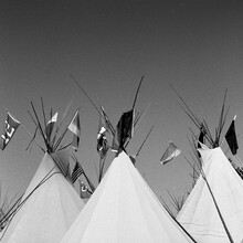 Three Teepees With Flags