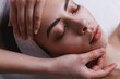 © Oleksii Syrotkin/Stocksy - Facial massage at spa centre