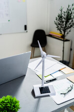 Wind Turbine Shaped Electric Fan Standing On Office Desk