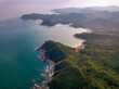 © Konstantin Trubavin/Westend61 - Aerial view of forested coastline at dusk