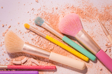 Canvas Print - Make up brushes with powder on white background