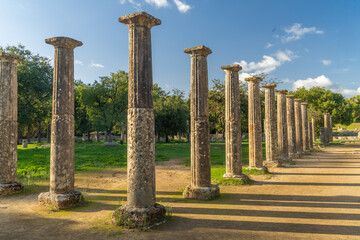 Ruins of the Palestra in the archeological site of Olympia, Greece, a major Panhellenic religious sanctuary of ancient Greece, where the ancient Olympic Games were held.