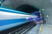 Motion Blur Of A Train Coming Out Of Subway Tunnel At Metro De Santiago