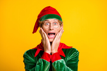 Canvas Print - Close-up portrait of his he nice attractive amazed glad cheerful cheery funny guy elf Eve Noel newyear party wow December sale isolated over bright vivid shine vibrant yellow color background