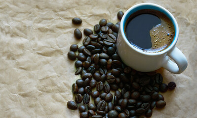 white cup with coffee on the table