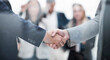 © ASDF - close up. confident business handshake on an office background.