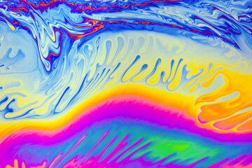 Wall Mural - Psychedelic multicolored patterns background. Photo macro shot of soap bubbles