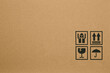 © runrun2 - Black fragile symbol on cardboard box
