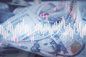 Double exposure of forex graph drawing over us dollars bill background. Concept of financial markets.