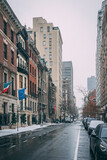 Fototapeta  - 69th Street in the snow, on the Upper East Side, Manhattan, New York City