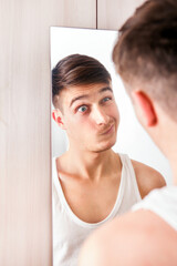 Canvas Print - Young Man near the Mirror